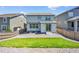 Well-manicured backyard featuring grass and a rock bed at 3325 Umber Cir, Castle Rock, CO 80109