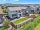 A well maintained backyard featuring a small grass area with gravel surrounding it at 3325 Umber Cir, Castle Rock, CO 80109
