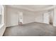 Bright bedroom featuring neutral walls, carpeted floor, and natural light at 3325 Umber Cir, Castle Rock, CO 80109