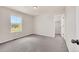 This bedroom has carpeted floors, baseboard trim and a window letting in tons of natural light at 3325 Umber Cir, Castle Rock, CO 80109