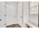 Inviting entryway with convenient bench seating and plenty of storage space at 3325 Umber Cir, Castle Rock, CO 80109