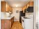 Efficient kitchen layout with updated appliances and plenty of cabinet space at 10211 Ura Ln # 304, Thornton, CO 80260