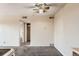 View into living area from kitchen showcasing the open layout and closet at 10211 Ura Ln # 304, Thornton, CO 80260