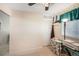 Neutral bedroom featuring closet and bright window with curtains at 650 S Clinton St # 11B, Denver, CO 80247