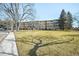 Building exterior with well-manicured lawn at 650 S Clinton St # 11B, Denver, CO 80247