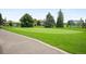 Golf course with mature trees surrounding a green at 650 S Clinton St # 11B, Denver, CO 80247