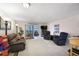 Cozy living room with neutral colors, comfortable seating, and lots of natural light at 650 S Clinton St # 11B, Denver, CO 80247