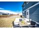 Relax in this spacious backyard featuring a patio and ample room for outdoor activities at 2091 Basil St, Strasburg, CO 80136