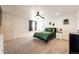 Bright bedroom with a ceiling fan, large bed, and a window at 2091 Basil St, Strasburg, CO 80136
