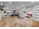 Large finished basement offering a recreation area, kitchenette, and cozy seating for relaxation and entertainment at 6040 Virgil St, Arvada, CO 80403
