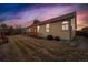 Back exterior view featuring a grassy yard with a house and a blue sky in the background at 12776 Yates Cir, Broomfield, CO 80020