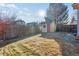 Fenced backyard with sunny exposure, storage shed, and mature shade trees at 12776 Yates Cir, Broomfield, CO 80020