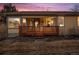 Exterior backyard featuring a raised wooden deck and a large grassy yard at 12776 Yates Cir, Broomfield, CO 80020