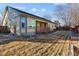 Spacious backyard with a wood fence and established grass, perfect for outdoor entertaining at 12776 Yates Cir, Broomfield, CO 80020