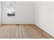 Neutral bedroom with carpet, window with blinds, and blank white walls at 12776 Yates Cir, Broomfield, CO 80020