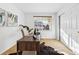 Bright office featuring a contemporary desk, neutral walls and large window overlooking the neighborhood at 12776 Yates Cir, Broomfield, CO 80020