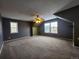 Large carpeted bedroom with large windows allowing lots of natural light at 10712 Dayton Way, Commerce City, CO 80640