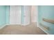 This bedroom includes closet space and an open doorway to a hallway, offering convenience and functionality at 3578 Tranquility Trl, Castle Rock, CO 80109