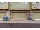 Attached garages feature brick facade, siding, and a convenient location in front at 3578 Tranquility Trl, Castle Rock, CO 80109