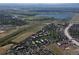 Aerial view of the community, showcasing its proximity to the lake, highway and city at 13952 E Marina Dr # 509, Aurora, CO 80014