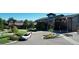 Well-maintained clubhouse exterior with lush landscaping and a convenient parking area at 13952 E Marina Dr # 509, Aurora, CO 80014