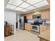 Charming kitchen design featuring stainless steel appliances and ample counter space, perfect for cooking at 13952 E Marina Dr # 509, Aurora, CO 80014