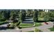 Scenic aerial shot of a tennis court, pond and bridge surrounded by lush green landscaping at 13952 E Marina Dr # 509, Aurora, CO 80014
