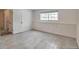 Finished basement with fresh paint and new floor with access to stairway at 9135 W Maplewood Ave, Littleton, CO 80123