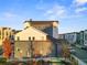 Rear view of townhouses, highlighting the building's design and private parking at 3553 W 63Rd Ave, Denver, CO 80221