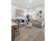 Living room with neutral color palette and ample natural light at 3553 W 63Rd Ave, Denver, CO 80221