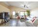 Spacious living room with vaulted ceilings and hardwood style floors at 5106 Eagle Ct, Denver, CO 80239