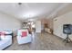 Living room view with hardwood style floors, speaker system, and vaulted ceiling at 5106 Eagle Ct, Denver, CO 80239