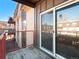 Balcony view with sliding glass door at 7755 E Quincy Ave # 203A2, Denver, CO 80237