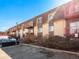 Exterior view of the building featuring private balconies at 7755 E Quincy Ave # 203A2, Denver, CO 80237