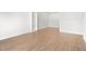 Bright living room featuring wood floors and ceiling fan at 7755 E Quincy Ave # 203A2, Denver, CO 80237
