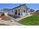 Charming backyard with patio and partial landscaping, creating a serene outdoor space at 1160 Spencer Pl, Erie, CO 80026