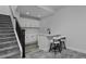 Basement bar featuring a neutral color scheme, bar seating, storage, and modern fixtures at 1160 Spencer Pl, Erie, CO 80026