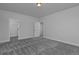 Bright bedroom with a closet entrance for storage and organization at 1160 Spencer Pl, Erie, CO 80026