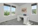 Office featuring a white desk, natural light, neutral walls, and carpeted floors at 1160 Spencer Pl, Erie, CO 80026
