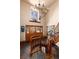 Grand foyer showcasing a winding staircase, tiled floors, and wood-framed glass doors leading to the outdoors at 730 Crescent Ln, Lakewood, CO 80214