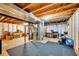 Spacious unfinished basement with exposed ceiling, ample room for storage, and potential for customization at 1101 Ridgeview Cir, Broomfield, CO 80020