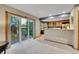 Bright living room with sliding glass doors to the backyard, seamlessly connecting indoor and outdoor spaces at 1101 Ridgeview Cir, Broomfield, CO 80020