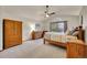 View of main bedroom featuring a vaulted ceiling, natural light and wooden furniture at 1101 Ridgeview Cir, Broomfield, CO 80020