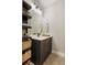 Modern bathroom with floating vanity and shelving at 1074 Knox Ct, Denver, CO 80204