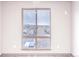 Large window showcasing city and mountain views at 12983 W Ida Ave # 408, Littleton, CO 80127