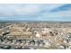 Aerial view of a neighborhood with a high school and athletic fields at 21589 E Union Pl, Aurora, CO 80015