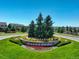 Copperleaf community entrance with landscaping and signage at 21589 E Union Pl, Aurora, CO 80015