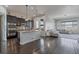 Spacious kitchen with an island and stainless steel appliances at 21589 E Union Pl, Aurora, CO 80015