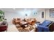 Basement featuring neutral walls, carpet, seating, and 'Personal Cave' decor at 14157 E 26Th Ave, Aurora, CO 80011