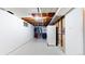 Unfinished basement with a closet, open ceiling and some exposed duct work at 14157 E 26Th Ave, Aurora, CO 80011